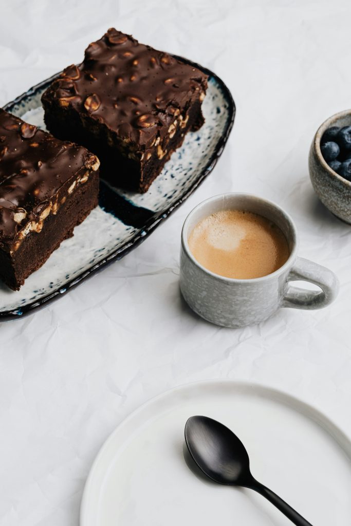 pexels-photo-5386685-5386685 Rich chocolate cake with espresso and blueberries, perfect for dessert lovers.